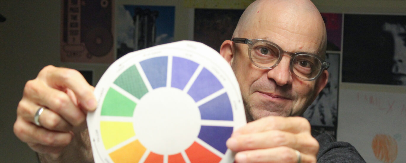 Stephen Ramos holding a color wheel