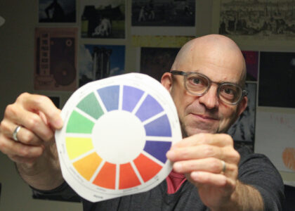 Stephen Ramos holding a color wheel